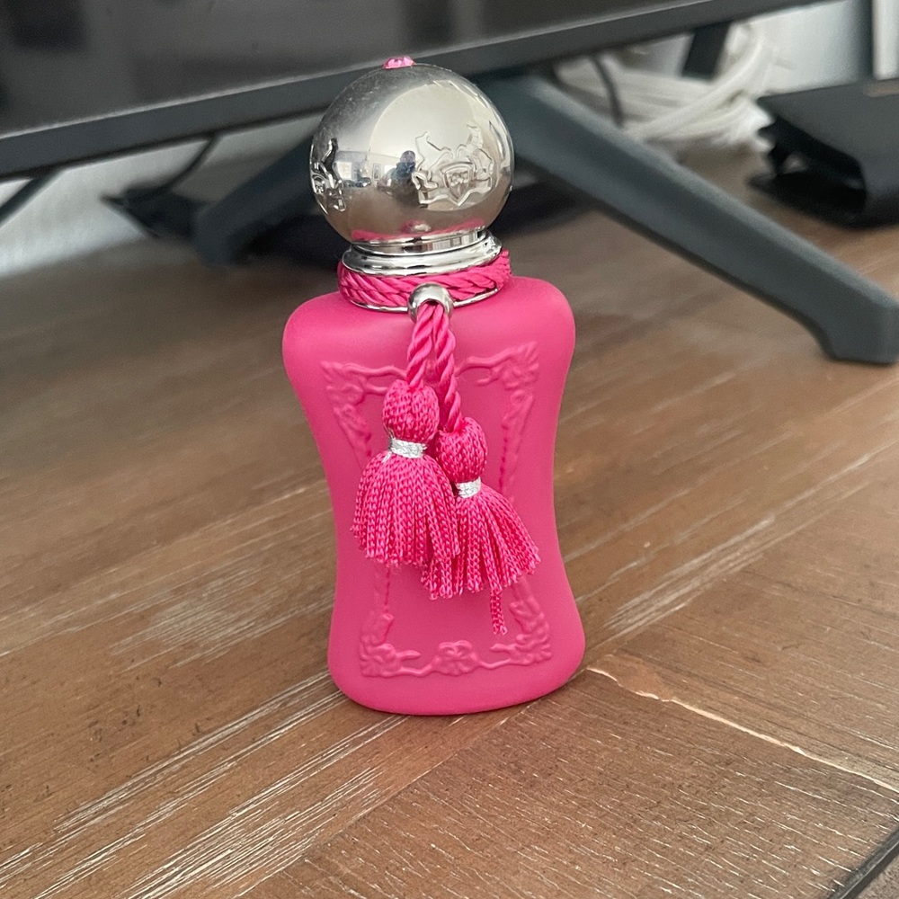 Vibrant Pink Perfume with Silver Cap